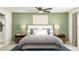 Serene bedroom features a plush bed, elegant nightstands, soft lighting, and tranquil decor at 10212 Gentle Rain Dr, Land O Lakes, FL 34638