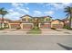 Beautiful exterior of townhomes with brick driveways, garages and lush landscaping at 10800 Tarflower Dr # 202, Venice, FL 34293