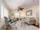 Inviting living room with stylish furnishings, a ceiling fan, and abundant natural light at 1108 Commodore St, Clearwater, FL 33755