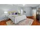 This bedroom offers beautiful wood floors and natural light at 1213 Halifax Ct, Tarpon Springs, FL 34688