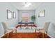 The office features a ceiling fan, wood floors, and natural light at 1213 Halifax Ct, Tarpon Springs, FL 34688