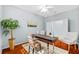 Office offers neutral decor and wood floors at 1213 Halifax Ct, Tarpon Springs, FL 34688