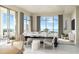 Bright living room with floor to ceiling windows offering panoramic views of the ocean at 126 4Th Ne Ave # 2201, St Petersburg, FL 33701