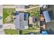 Backyard with pool, tiki hut, boat dock and lift overlooking the water at 13429 Lisa Dr, Hudson, FL 34667