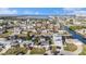 Expansive aerial view showcases a waterfront community with canal access and vibrant coastal living at 13429 Lisa Dr, Hudson, FL 34667