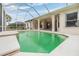 Enclosed pool area for leisure and entertainment at 13941 Talmage Loop, Hudson, FL 34667
