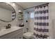 Well-maintained bathroom with a vanity, shower-tub combo, and stylish decor at 1546 Pleasant Rd # J1, Bradenton, FL 34207
