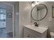 Bathroom vanity with modern lighting and fixtures at 1546 Pleasant Rd # J1, Bradenton, FL 34207