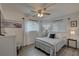 Well-lit bedroom featuring a queen bed, closet space, and contemporary decor at 1546 Pleasant Rd # J1, Bradenton, FL 34207