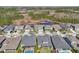 A great aerial view of the neighborhood highlighting neatly arranged homes and scenic water features at 16407 Frehley Run, Land O Lakes, FL 34638