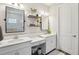 Elegant bathroom with marble countertops, modern fixtures, and dual vanities at 16407 Frehley Run, Land O Lakes, FL 34638