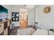 Inviting living area with modern decor, wood floors, and access to the open-concept kitchen at 16407 Frehley Run, Land O Lakes, FL 34638