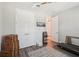 Bright office space with a treadmill, closet, and wood-look floors at 16407 Frehley Run, Land O Lakes, FL 34638