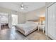Comfortable bedroom with tile floors, ceiling fan, and access to the bathroom at 17108 Carrington Park Dr # 701, Tampa, FL 33647