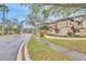The beautiful entrance to Jade at Tampa Palms with lush landscaping at 17108 Carrington Park Dr # 701, Tampa, FL 33647