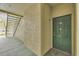 This image features a condo entryway and a staircase leading to the upper floors at 17108 Carrington Park Dr # 701, Tampa, FL 33647