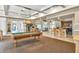 Recreation area with a pool table, and bar, perfect for entertaining guests at 17108 Carrington Park Dr # 701, Tampa, FL 33647