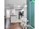 A well-lit kitchen with granite countertops, stainless steel appliances and hardwood flooring at 17108 Carrington Park Dr # 701, Tampa, FL 33647