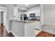 Bright, well-equipped kitchen with white cabinetry, granite counters, and stainless steel appliances at 17108 Carrington Park Dr # 701, Tampa, FL 33647