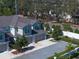 Overhead view of townhome with a two-car garage, manicured lawn, and attractive curb appeal at 1986 Lake Ridge Blvd, Clearwater, FL 33763