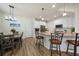 Spacious kitchen with a granite countertop island and a view of the dining area at 1986 Lake Ridge Blvd, Clearwater, FL 33763