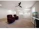 Spacious loft area with comfortable seating and a media center, perfect for relaxation and entertainment at 1986 Lake Ridge Blvd, Clearwater, FL 33763