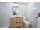 Modern bathroom features marble walls, sleek vanity, and contemporary fixtures at 208 Palmetto W Rd, Nokomis, FL 34275