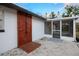Outdoor shower and screened patio on gravel lot at 208 Palmetto W Rd, Nokomis, FL 34275