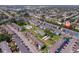 Aerial shot of the community featuring mature trees, landscaping, and parking at 2113 Canal Dr # B2, Bradenton, FL 34207