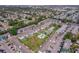 Stunning aerial view of community featuring a sparkling pool, lush landscaping, and ample parking at 2113 Canal Dr # B2, Bradenton, FL 34207