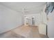 Light-filled bedroom with neutral walls, carpeted floors, and access to the ensuite bathroom and closet at 2113 Canal Dr # B2, Bradenton, FL 34207