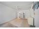 Bedroom with neutral carpet, ceiling fan, and a walk-in closet, offering ample storage at 2113 Canal Dr # B2, Bradenton, FL 34207