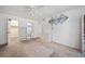 Spacious bedroom featuring neutral walls, carpeted floors, walk-in closet, and an ensuite bathroom at 2113 Canal Dr # B2, Bradenton, FL 34207