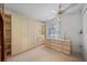 Bedroom featuring built-in storage and a window, offering ample space and natural light at 2113 Canal Dr # B2, Bradenton, FL 34207
