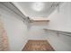 Walk-in closet with rod and shelf provides ample storage space and organization at 2113 Canal Dr # B2, Bradenton, FL 34207