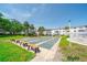 Inviting shuffleboard court perfect for friendly competition and relaxation in a lush green community setting at 2113 Canal Dr # B2, Bradenton, FL 34207