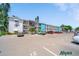 Exterior view of building with parking lot and well-maintained landscaping at 2113 Canal Dr # B2, Bradenton, FL 34207