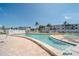 Inviting community pool surrounded by lush landscaping and comfortable seating, perfect for relaxing and soaking up the sun at 2113 Canal Dr # B2, Bradenton, FL 34207