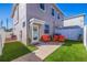 Backyard patio with outdoor furniture, a manicured lawn, and a fence at 3601 1St S Ave, St Petersburg, FL 33711