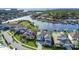 This aerial view showcases a waterfront community with private boat docks, lush landscaping, and serene water views at 4054 Rocky Shores Dr, Tampa, FL 33634