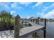 Private boat dock on the canal with a boat lift for easy access to boating and waterfront activities at 4054 Rocky Shores Dr, Tampa, FL 33634