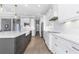 Spacious kitchen with an island, modern appliances, and a beautiful view of the home at 4054 Rocky Shores Dr, Tampa, FL 33634