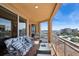 Spacious balcony with comfortable seating and sweeping views of the city and bay for perfect outdoor living at 501 Mandalay Ave # 601, Clearwater Beach, FL 33767