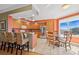 Eat-in kitchen includes stainless appliances, granite countertops and island seating, perfect for casual dining at 501 Mandalay Ave # 601, Clearwater Beach, FL 33767