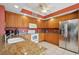 Well-appointed kitchen with stainless steel appliances, sleek granite countertops and ample cabinet storage space at 501 Mandalay Ave # 601, Clearwater Beach, FL 33767