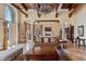 Spacious living room featuring a fireplace, high ceilings, and marble floors at 501 Mandalay Ave # 601, Clearwater Beach, FL 33767