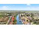 Aerial view of waterfront community featuring lush landscaping and direct canal access to the bay and Gulf at 5618 Baywater Dr # 5618, Tampa, FL 33615