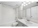 Bathroom with neutral cabinets and vanity with a shower/tub combination at 5618 Baywater Dr # 5618, Tampa, FL 33615
