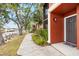 Charming condo entrance with well-manicured landscaping, and a water view along a private walkway at 5618 Baywater Dr # 5618, Tampa, FL 33615