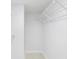 A basic walk-in closet with a wire shelf at 5618 Baywater Dr # 5618, Tampa, FL 33615